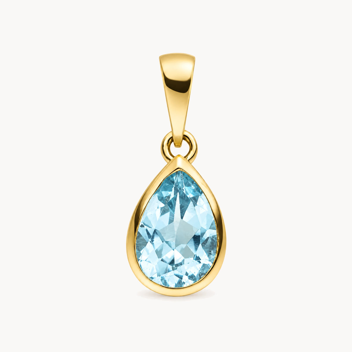 Anhänger in 333er Gelbgold mit Blautopas
