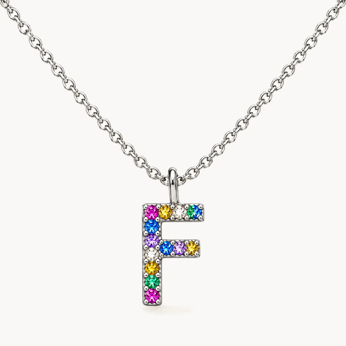 Buchstabencollier in 925er Silber rhodiniert mit gefärbtem Zirkonia – Buchstabe F