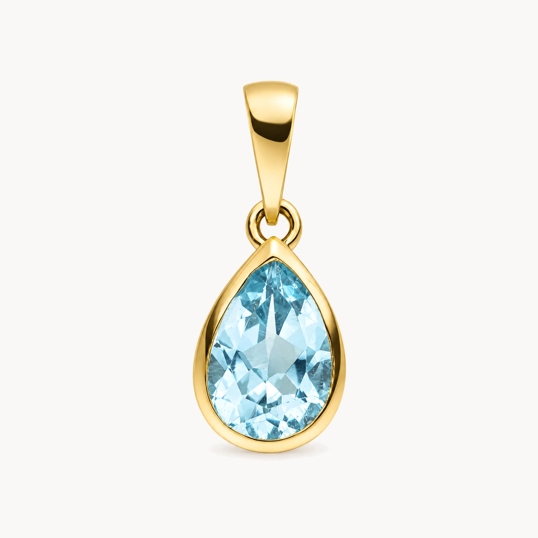 Anhänger in 333er Gelbgold mit Blautopas