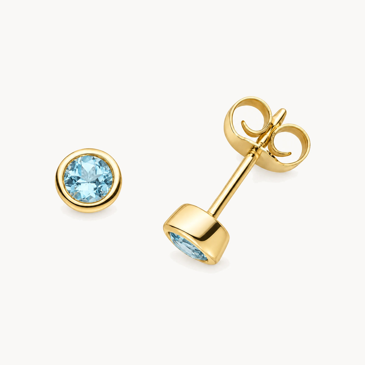 Ohrstecker in 333er Gelbgold mit Blautopas