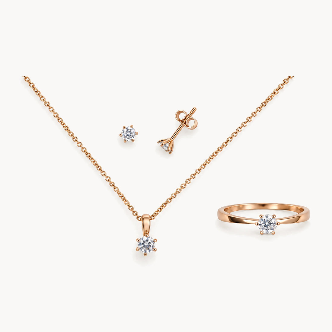 Collier/Ohrstecker/Ring in 333er Rotgold mit Zirkonia