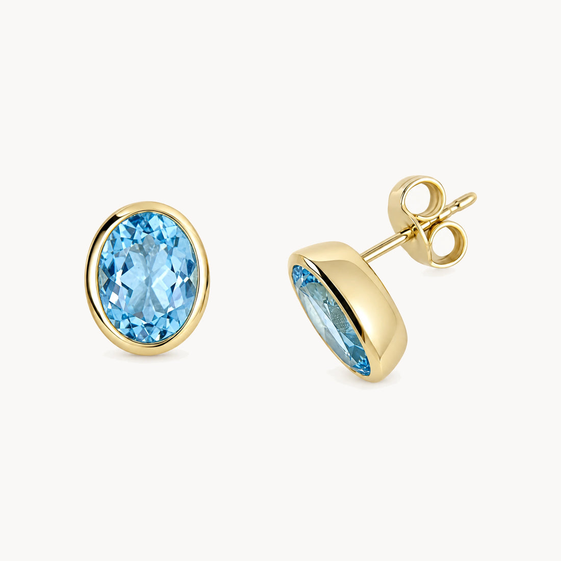 Ohrstecker in 585er Gelbgold mit Blautopas