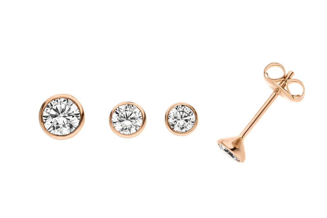 Ohrstecker in 333er Gold mit Zirkonia, Zargenfassung