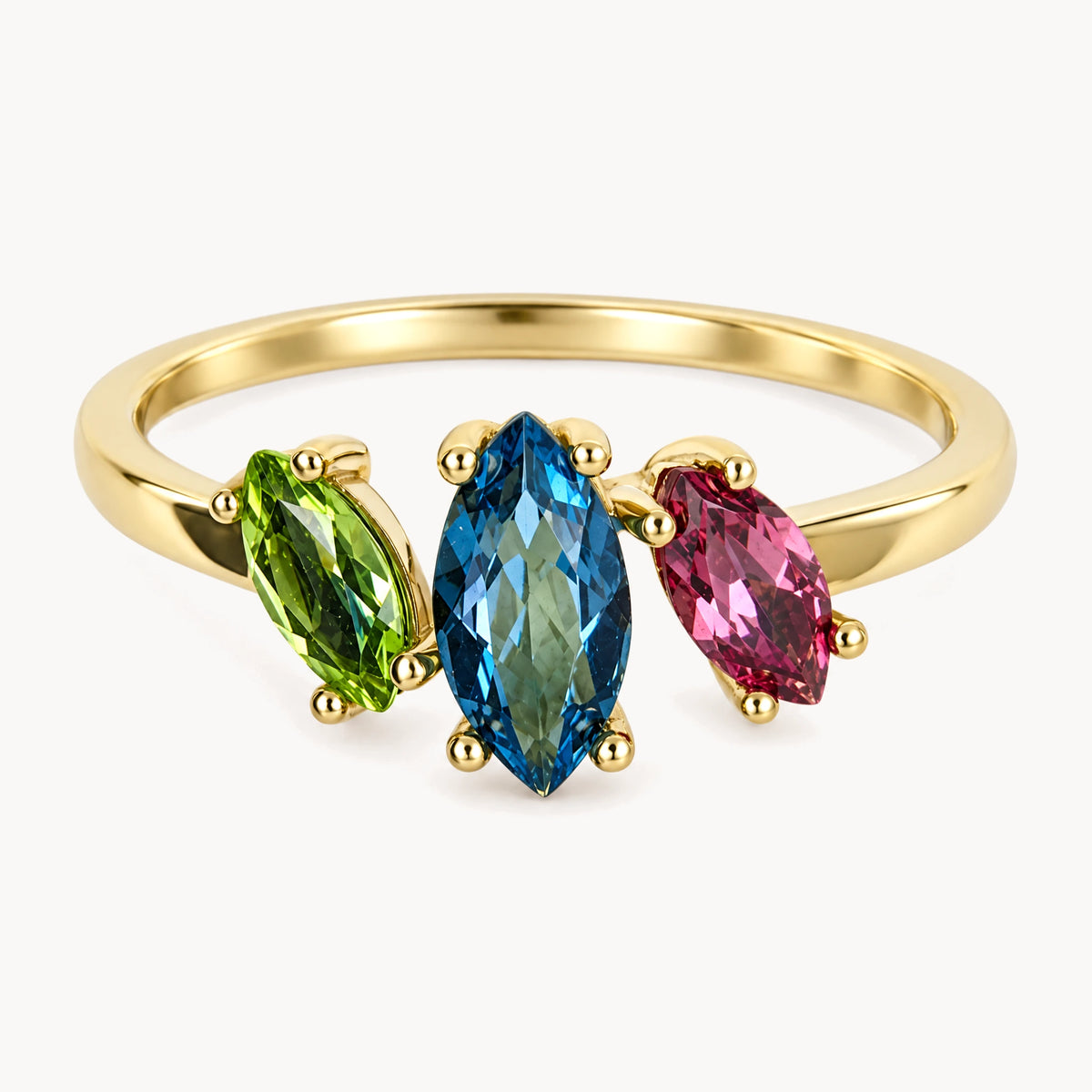 Damenring in 585er Gelbgold mit Blautopas, Peridot &amp; Rhodolith